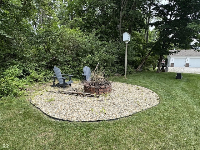 188 Gettysburg, Coatesville, IN 46121 - view of grassy yard with a fire pit