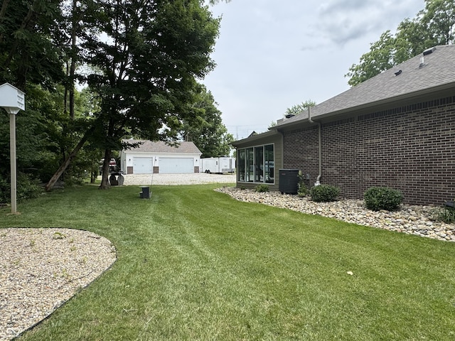 188 Gettysburg, Coatesville, IN 46121 - view of green lawn featuring a detached garage