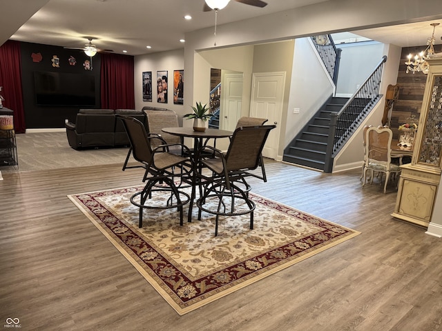 188 Gettysburg, Coatesville, IN 46121 - dining space featuring ceiling fan, stairs, wood finished floors, recessed lighting, and a chandelier