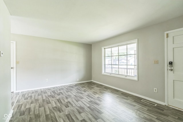 609 Willow Dr, Shelbyville, IN 46176 - spare room with wood finished floors and baseboards