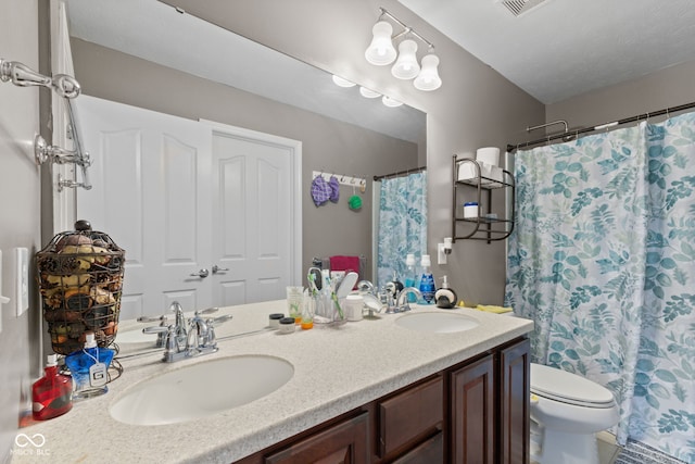 7350 Gold King Way, Indianapolis, IN 46259 - bathroom with double vanity and a shower with shower curtain