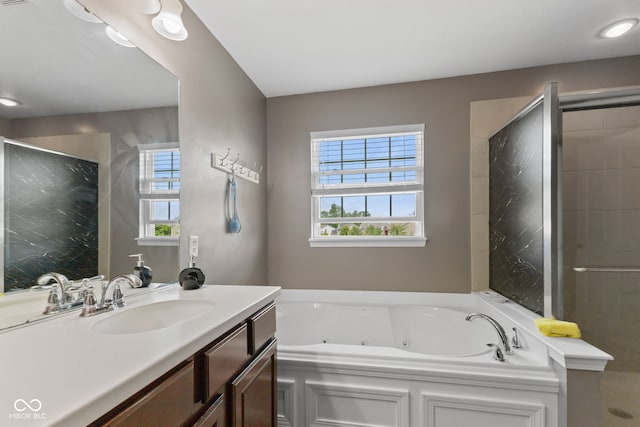 7350 Gold King Way, Indianapolis, IN 46259 - bathroom with a whirlpool tub, healthy amount of natural light, vanity, and a shower stall