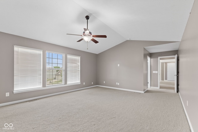 7350 Gold King Way, Indianapolis, IN 46259 - unfurnished room with light carpet, ceiling fan, and lofted ceiling