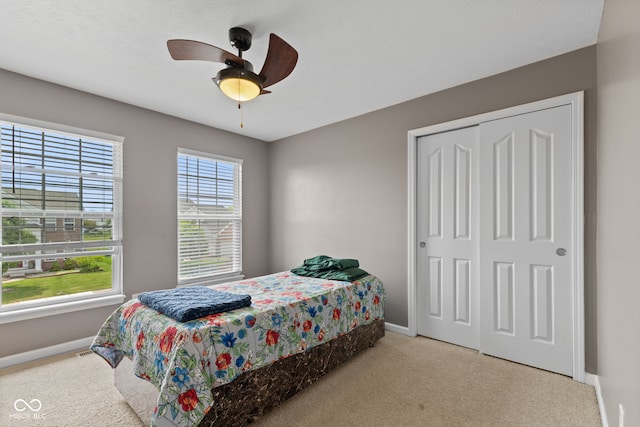 7350 Gold King Way, Indianapolis, IN 46259 - carpeted bedroom featuring a closet and a ceiling fan