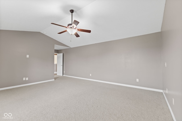 7350 Gold King Way, Indianapolis, IN 46259 - empty room with a ceiling fan, lofted ceiling, and carpet floors