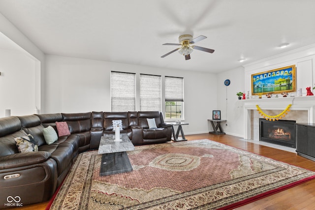 7350 Gold King Way, Indianapolis, IN 46259 - living room featuring ceiling fan, wood finished floors, and a tile fireplace
