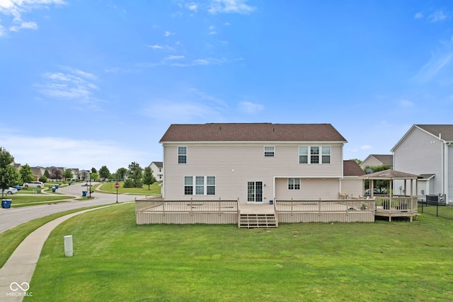 7350 Gold King Way, Indianapolis, IN 46259 - back of property with a wooden deck and a yard