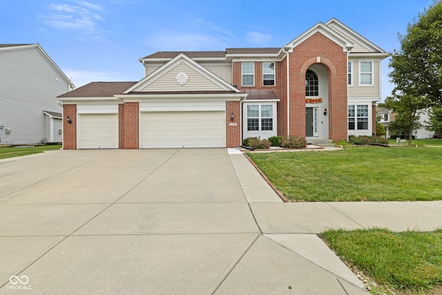 7350 Gold King Way, Indianapolis, IN 46259 - view of front of home with brick siding, a front lawn, a garage, and concrete driveway