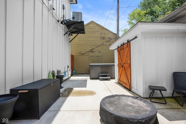 934 Calvary St, Indianapolis, IN 46203 - view of patio / terrace featuring a hot tub