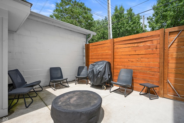 934 Calvary St, Indianapolis, IN 46203 - fenced backyard featuring a grill and a patio