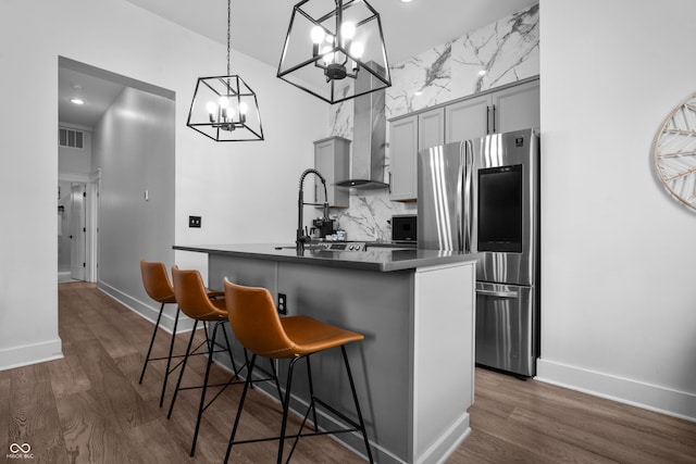 934 Calvary St, Indianapolis, IN 46203 - kitchen featuring smart refrigerator, gray cabinetry, wall chimney exhaust hood, a chandelier, and dark wood-style flooring