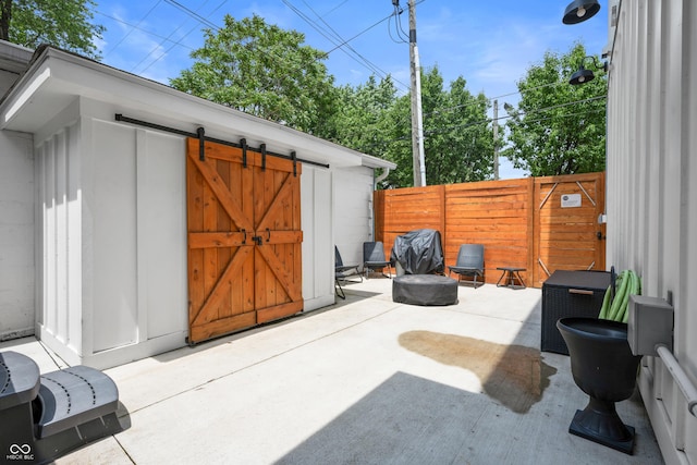 934 Calvary St, Indianapolis, IN 46203 - view of patio / terrace featuring a shed