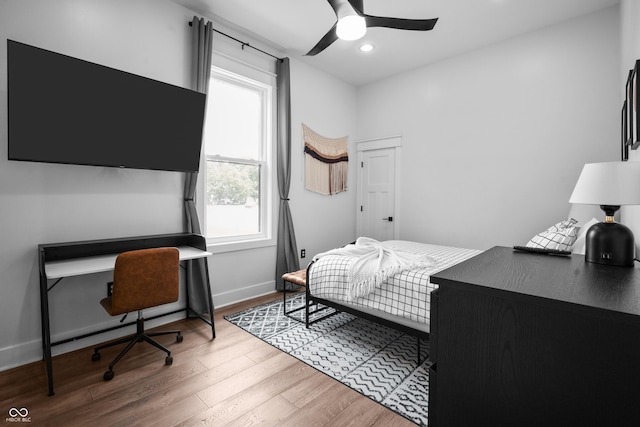 934 Calvary St, Indianapolis, IN 46203 - bedroom with wood finished floors, a desk, recessed lighting, and a ceiling fan