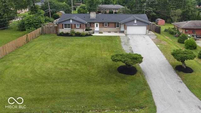 4430 Wexford Rd, Indianapolis, IN 46226 - view of front of property with concrete driveway, a chimney, stone siding, and a garage