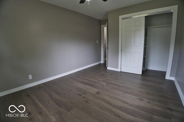 4430 Wexford Rd, Indianapolis, IN 46226 - unfurnished bedroom featuring dark wood-type flooring, a closet, and ceiling fan