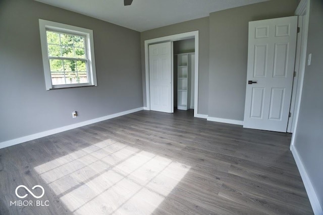 4430 Wexford Rd, Indianapolis, IN 46226 - unfurnished bedroom featuring dark wood-type flooring and a closet