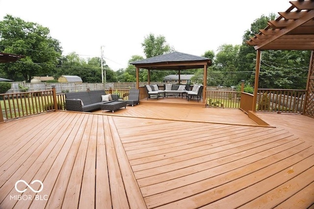 4430 Wexford Rd, Indianapolis, IN 46226 - wooden deck featuring an outdoor living space, a gazebo, and a fenced backyard