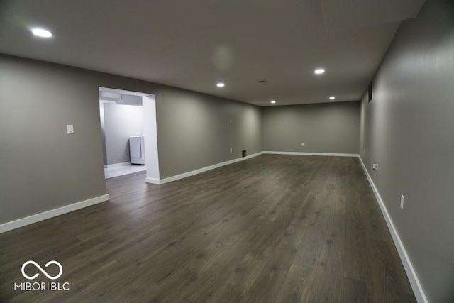 4430 Wexford Rd, Indianapolis, IN 46226 - empty room featuring recessed lighting, dark wood-style floors, and washer / dryer