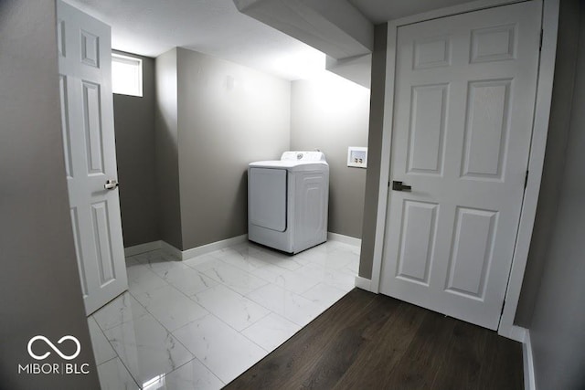 4430 Wexford Rd, Indianapolis, IN 46226 - washroom with washer / dryer and marble look tile flooring