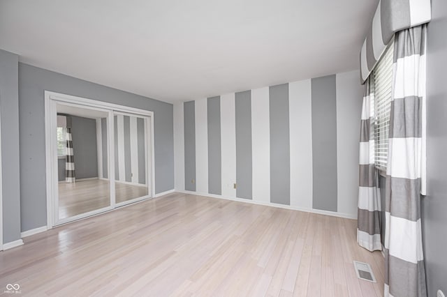 303 E County Road 500 N, Pittsboro, IN 46167 - unfurnished room featuring light wood-style flooring and wallpapered walls