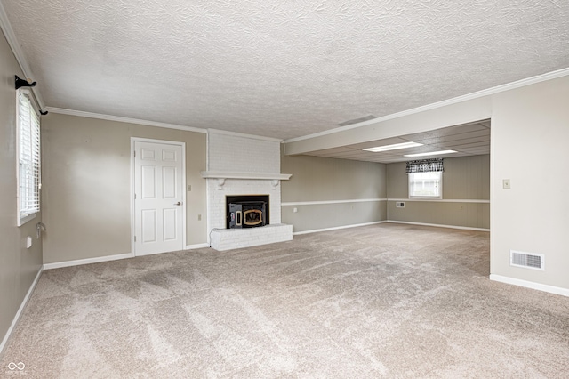 303 E County Road 500 N, Pittsboro, IN 46167 - unfurnished living room with ornamental molding, carpet, a textured ceiling, and a brick fireplace