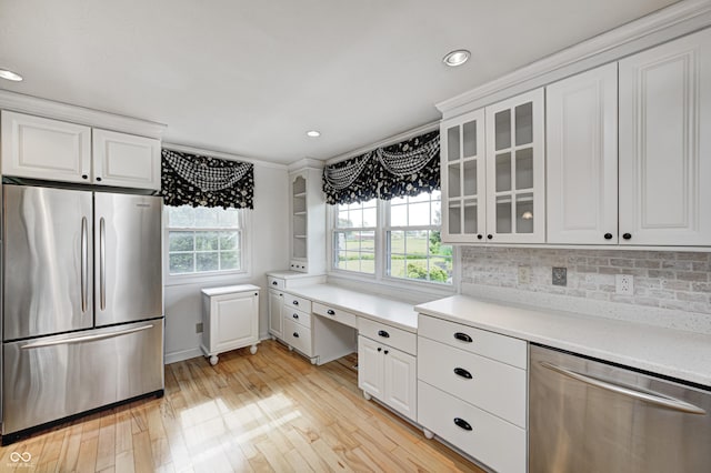 303 E County Road 500 N, Pittsboro, IN 46167 - kitchen featuring stainless steel appliances, white cabinets, light wood-type flooring, glass insert cabinets, and recessed lighting