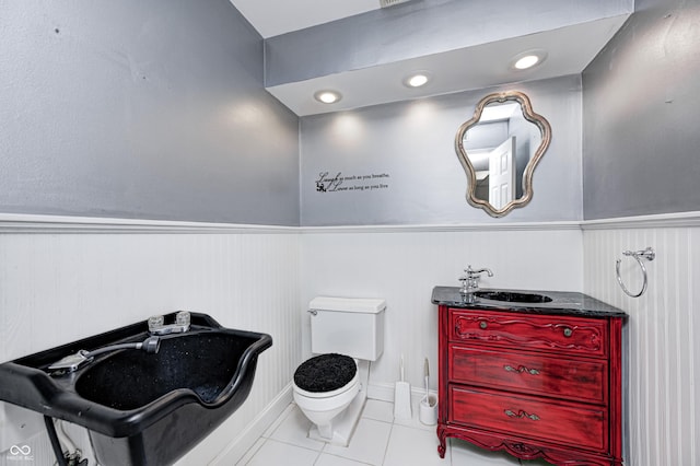 303 E County Road 500 N, Pittsboro, IN 46167 - bathroom with a wainscoted wall, tile patterned floors, and vanity