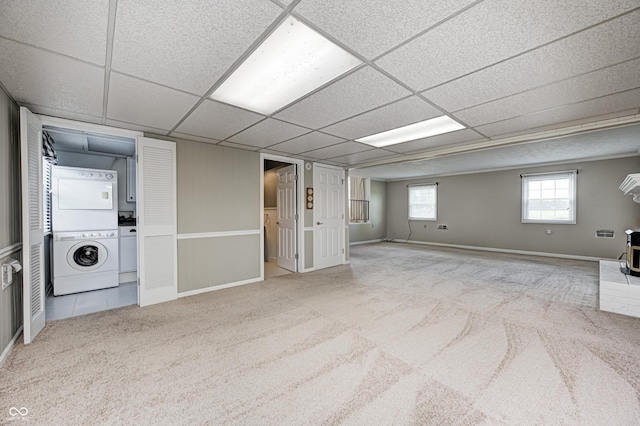 303 E County Road 500 N, Pittsboro, IN 46167 - below grade area featuring estacked washer and dryer, carpet flooring, and a drop ceiling