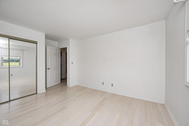 303 E County Road 500 N, Pittsboro, IN 46167 - unfurnished bedroom featuring light wood-style floors and a closet