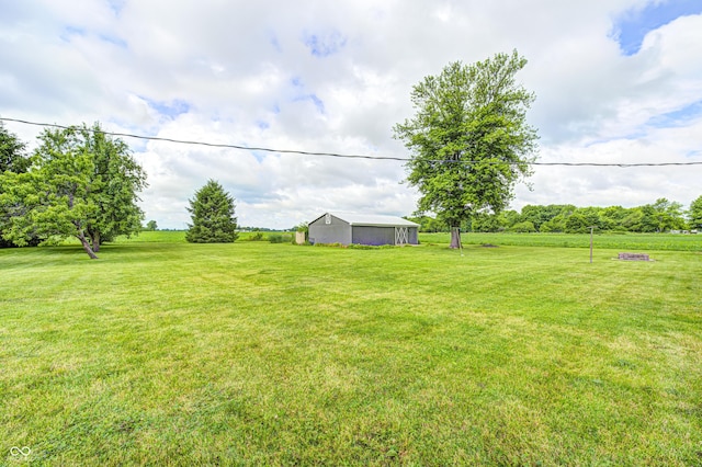 303 E County Road 500 N, Pittsboro, IN 46167 - view of green lawn with an outbuilding, an outdoor structure, and a view of countryside
