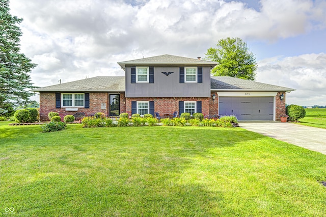 303 E County Road 500 N, Pittsboro, IN 46167 - tri-level home featuring a garage, driveway, brick siding, and a front lawn