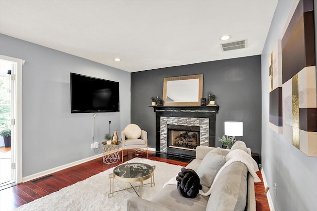 1099 Saratoga Cir, Carmel, IN 46280 - living room with wood finished floors, a tile fireplace, and recessed lighting