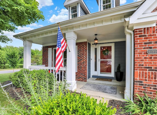 1099 Saratoga Cir, Carmel, IN 46280 - property entrance featuring brick siding and covered porch