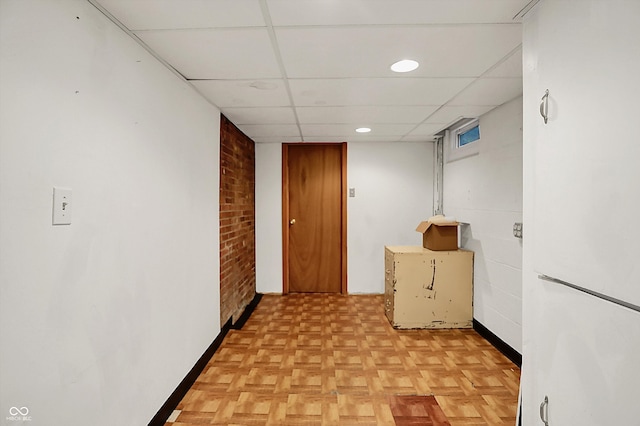 6430 E Southport Rd, Indianapolis, IN 46237 - hall with a drop ceiling and brick wall