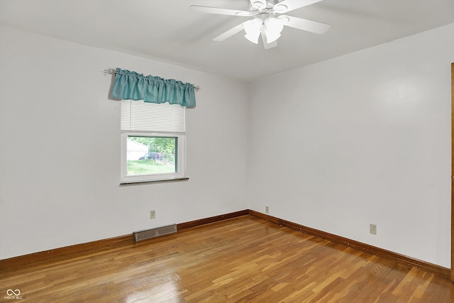 6430 E Southport Rd, Indianapolis, IN 46237 - spare room featuring light wood-style floors and a ceiling fan
