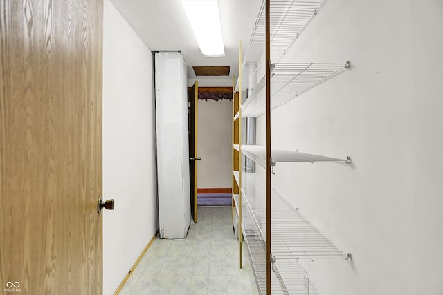 6430 E Southport Rd, Indianapolis, IN 46237 - walk in closet featuring tile patterned floors