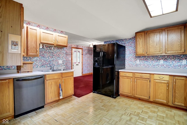 6430 E Southport Rd, Indianapolis, IN 46237 - kitchen with stainless steel dishwasher, wallpapered walls, black refrigerator with ice dispenser, light countertops, and brown cabinetry