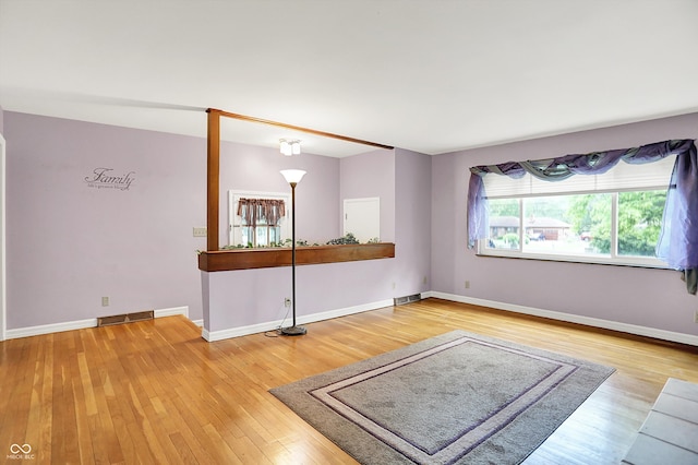 6430 E Southport Rd, Indianapolis, IN 46237 - unfurnished room with light wood-type flooring and baseboards