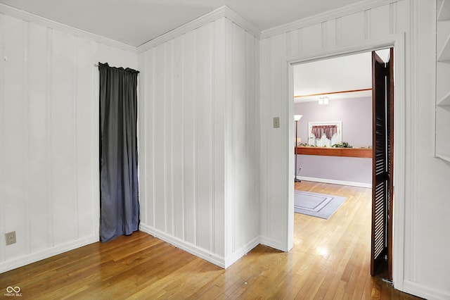 6430 E Southport Rd, Indianapolis, IN 46237 - unfurnished room with ornamental molding and light wood-style floors