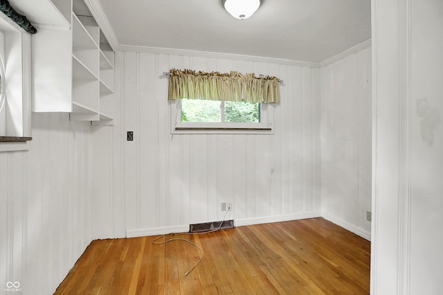 6430 E Southport Rd, Indianapolis, IN 46237 - spare room with wood-type flooring and ornamental molding