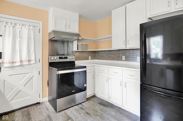 6430 E Southport Rd, Indianapolis, IN 46237 - kitchen featuring freestanding refrigerator, stainless steel range with electric stovetop, under cabinet range hood, open shelves, and white cabinetry