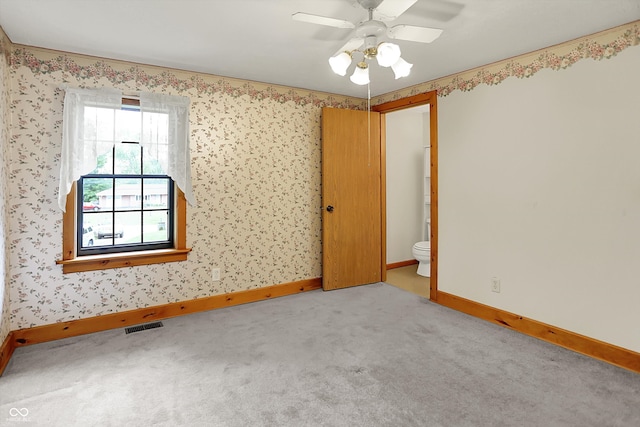 6430 E Southport Rd, Indianapolis, IN 46237 - unfurnished room with carpet and a ceiling fan