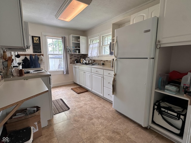 1433 N Colorado Ave, Indianapolis, IN 46201 - kitchen with white appliances, open shelves, white cabinets, a textured ceiling, and tasteful backsplash