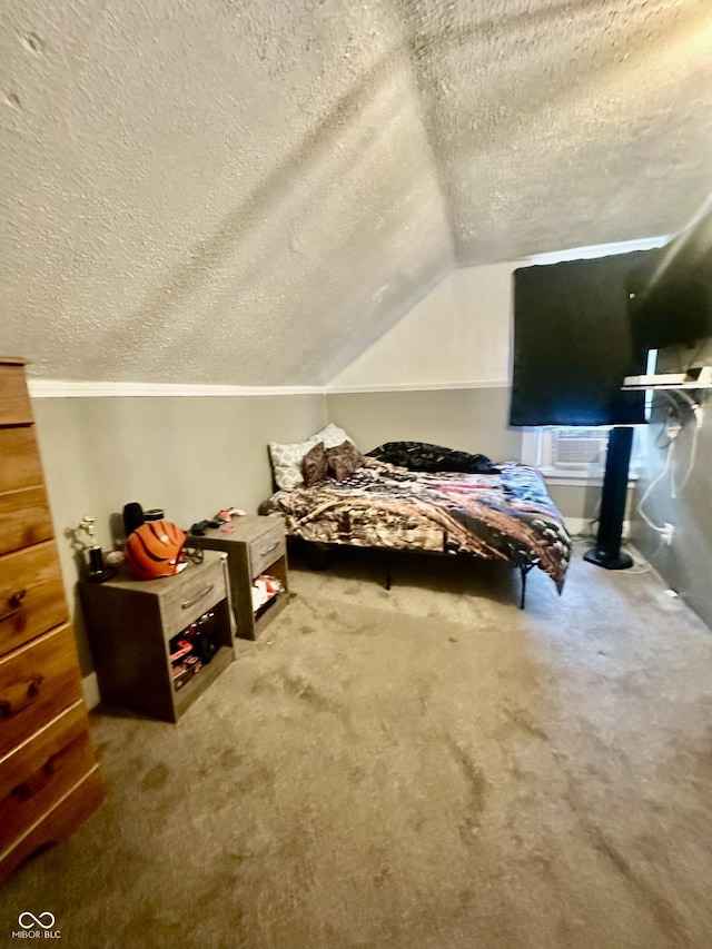 208 10th St, Covington, IN 47932 - bedroom featuring a textured ceiling, carpet flooring, and vaulted ceiling