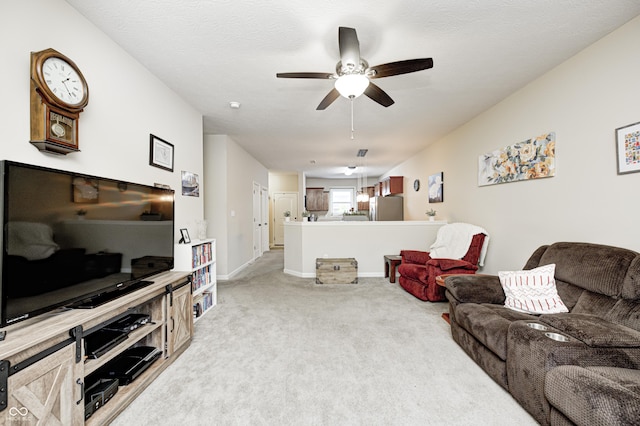 1331 Mccormicks Cir, Danville, IN 46122 - carpeted living area featuring ceiling fan and baseboards