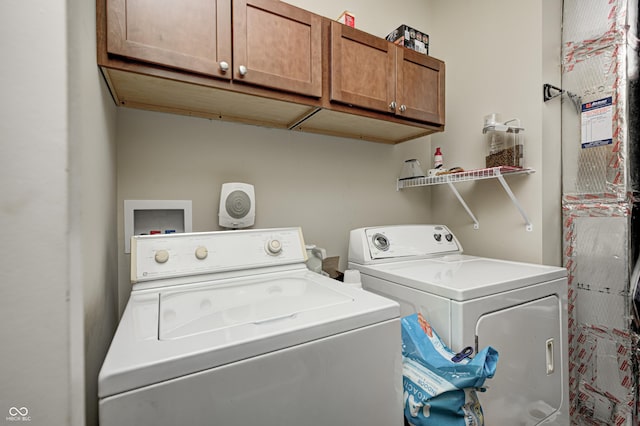 1331 Mccormicks Cir, Danville, IN 46122 - laundry area featuring cabinet space and washer and clothes dryer