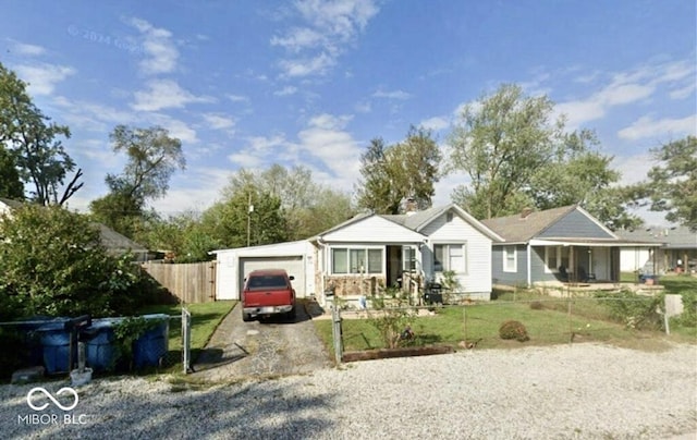 2638 S Mcclure St, Indianapolis, IN 46241 - ranch-style house with driveway and an attached garage
