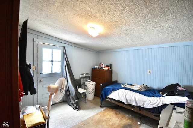 2638 S Mcclure St, Indianapolis, IN 46241 - bedroom featuring a textured ceiling and concrete flooring
