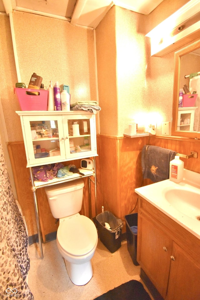 2638 S Mcclure St, Indianapolis, IN 46241 - bathroom featuring vanity and a wainscoted wall