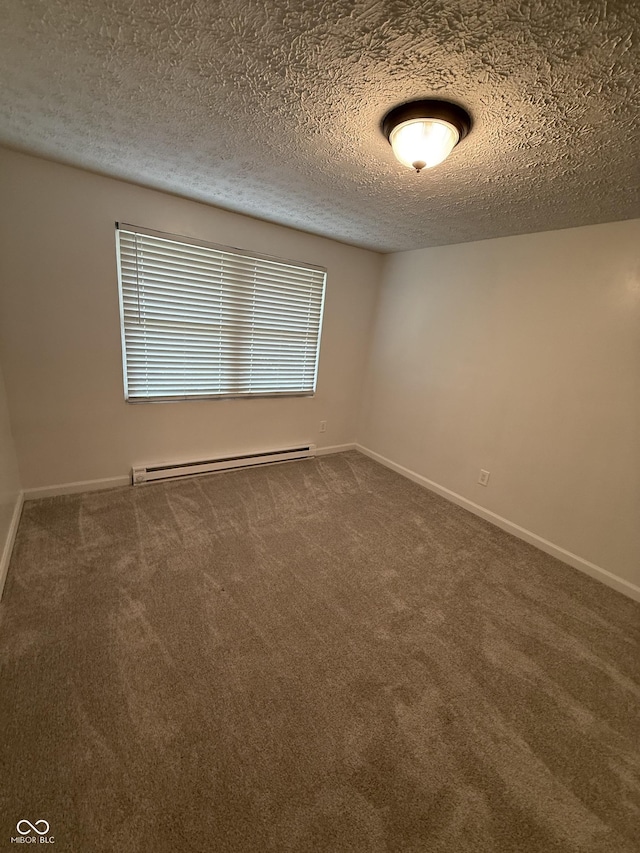 8434 Meadowlark Dr, Indianapolis, IN 46226 - unfurnished room with a baseboard radiator, carpet floors, and a textured ceiling